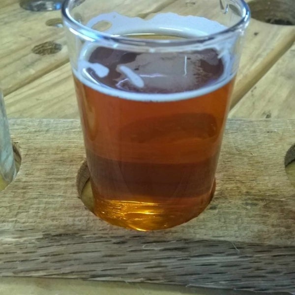 Photo taken at Woodcreek Brewing Company by Ernesto A. on 10/4/2015