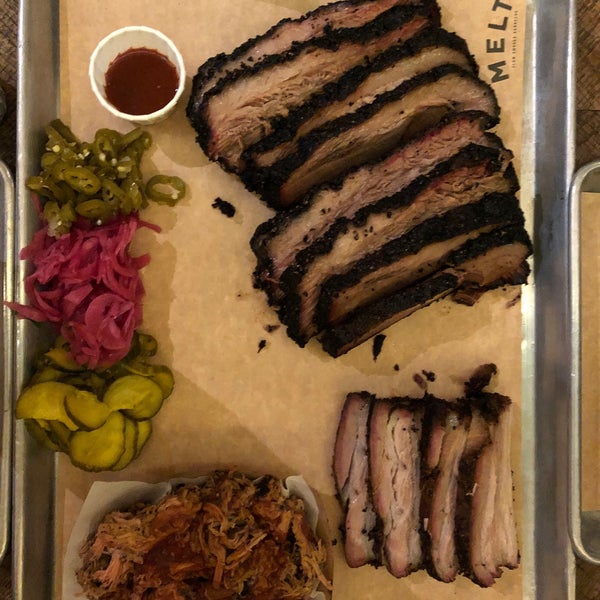 The brisket was delicious and the shredded pork was amazing