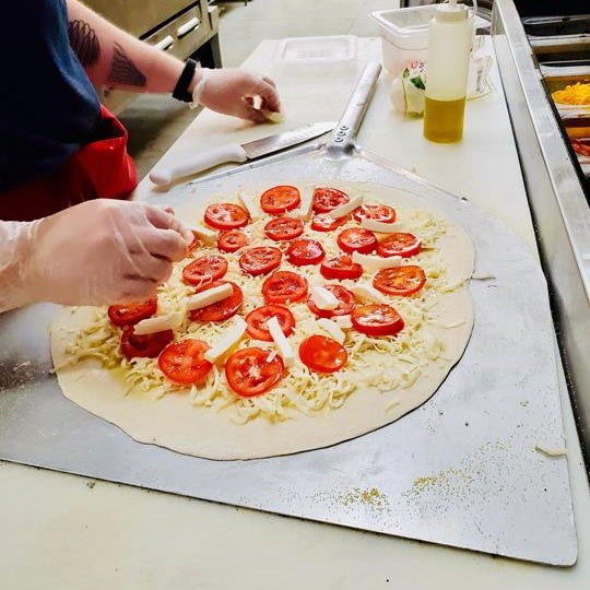 Foto tomada en Bop&#39;s Pizza  por Bop&#39;s Pizza el 7/31/2019