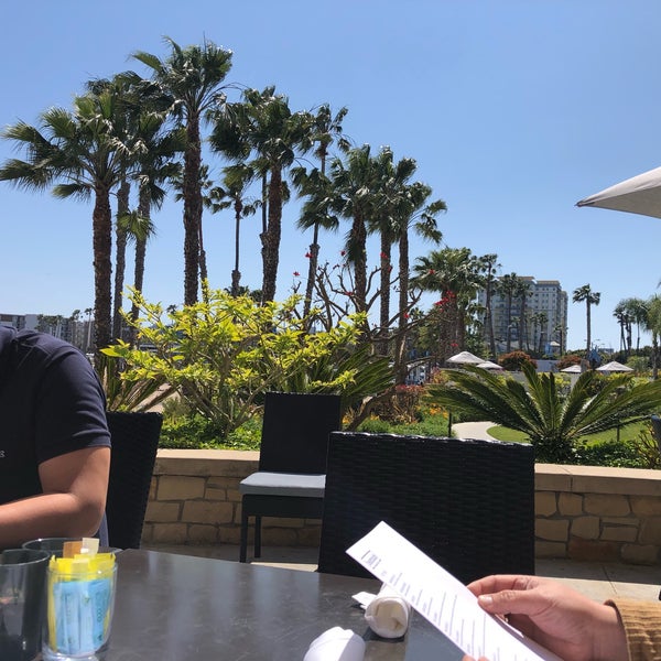 Photo taken at Beachside Restaurant and Bar by K J. on 4/21/2019