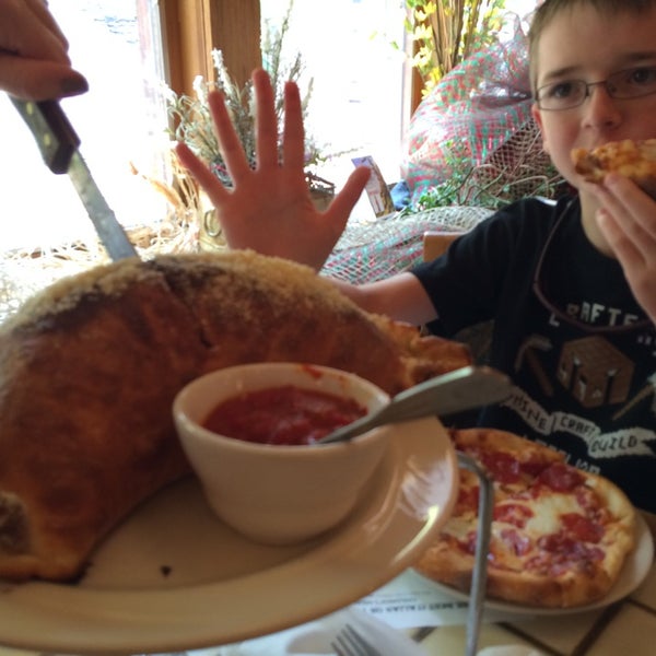 Huge portions, calzones are large enough to share.