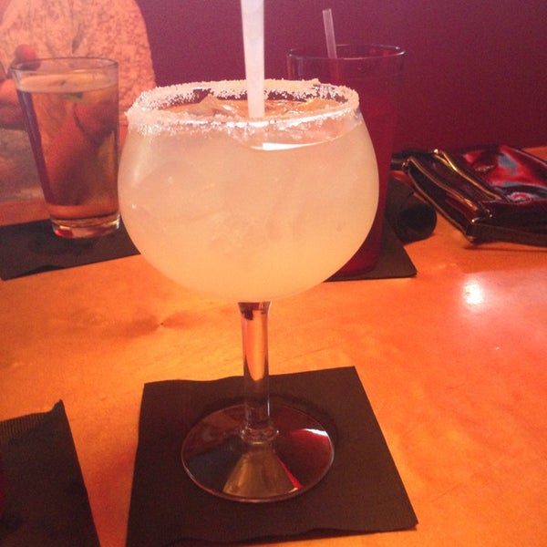 Photo taken at Roja Mexican Grill + Margarita Bar by Carly S. on 7/1/2013