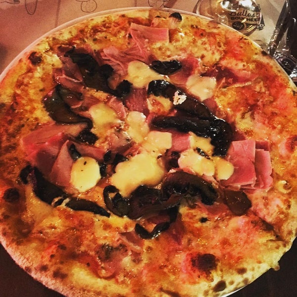 Photo taken at BEVO Bar + Pizzeria by T B. on 1/13/2016