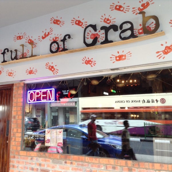 Photo taken at Full of Crab by Magdalene P. on 6/1/2014