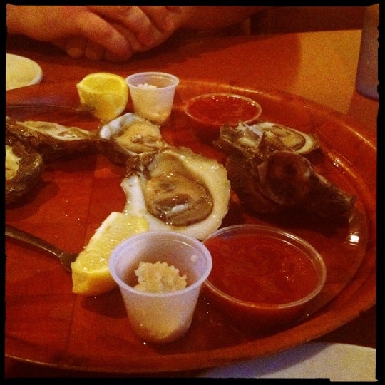 Photo taken at Jim Shaw&#39;s Seafood Grill by Bria D. on 1/24/2013