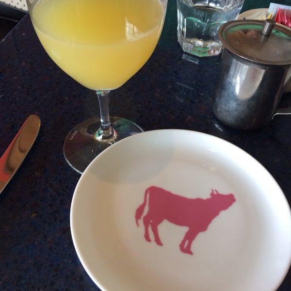 Not bad... $4 mimosas. I went with the Farm Eggs Your Way and got their grits & biscuit with homemade jelly. Yum!