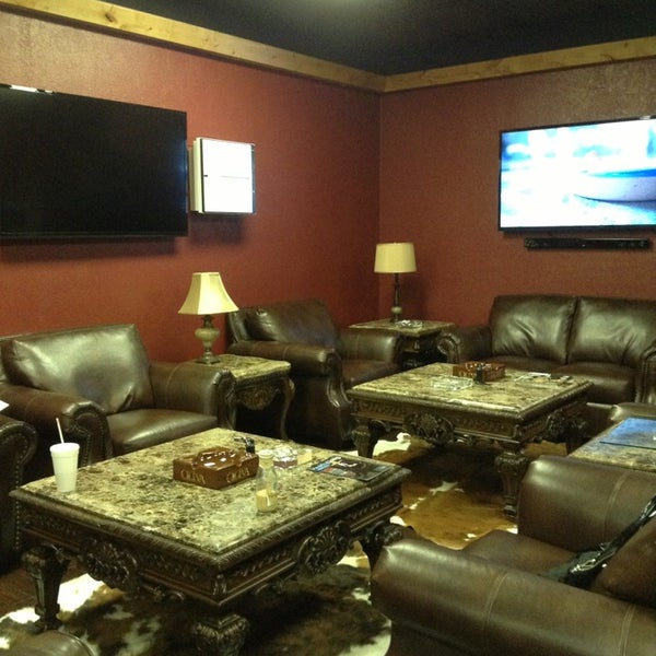 Photo taken at The Man Cave - Cigar &amp; Tobacco Lounge by Stephanie O. on 6/21/2013