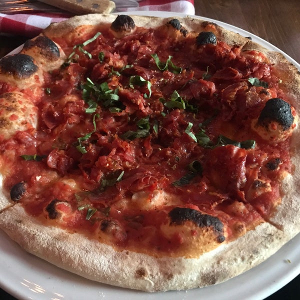 Photo taken at BEVO Bar + Pizzeria by Forrest on 5/11/2018