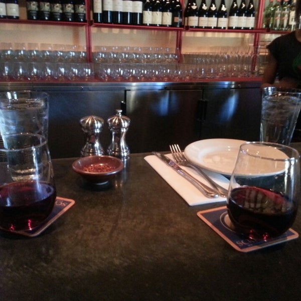 Photo taken at Rosso Pizzeria and Wine Bar by Alex E. on 2/24/2014