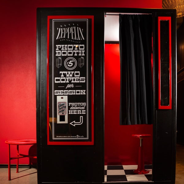 Slick hotel with a free game room and a restored black and red photo booth (digital). photomatica.com