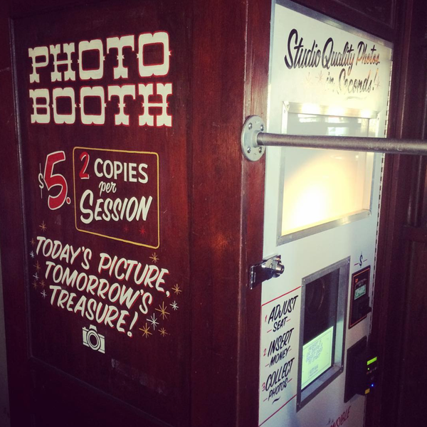 Classic San Franciscan pub with an old wooden phone booth converted into a photo booth. photomatica.com