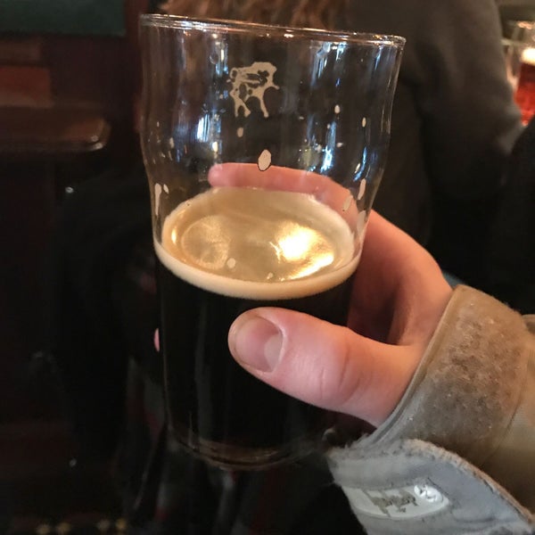 Photo taken at Sláinte Pub &amp; Grill by Tyler E. on 2/8/2018