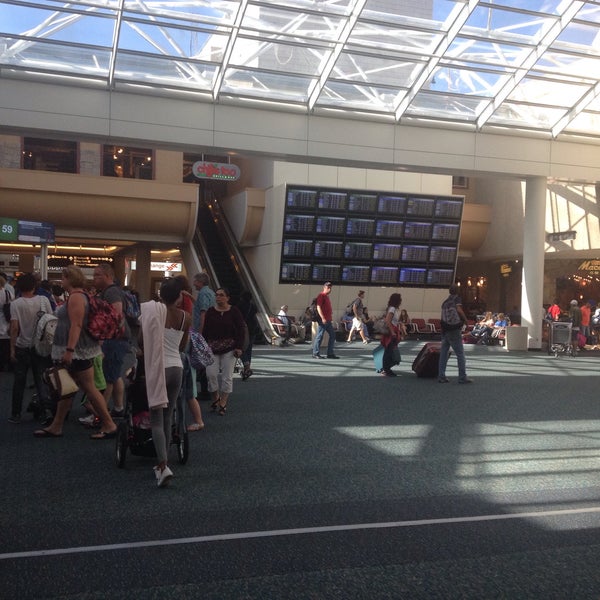 Photo taken at Orlando International Airport (MCO) by Henry on 6/15/2015