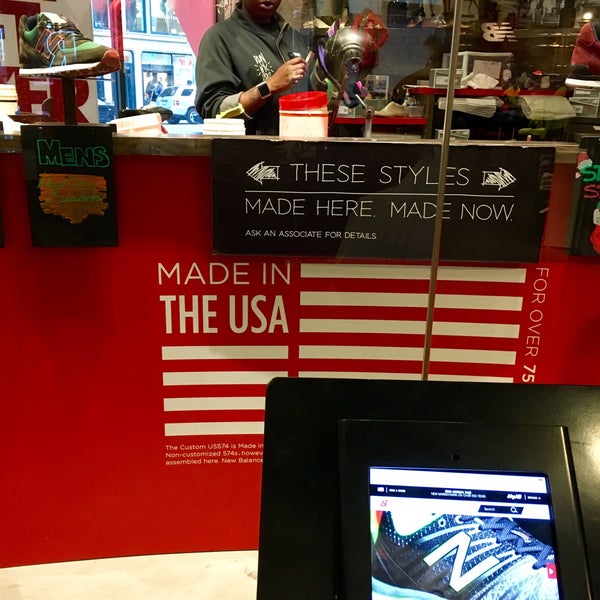 Photo taken at New Balance Flagship Store by Axel E. on 12/28/2015