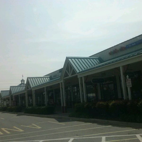 Photo taken at Tanger Outlets Rehoboth Beach by Jean-Evans P. on 5/22/2013