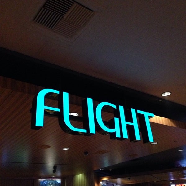 Photo taken at Flight Bar by Masashi S. on 6/20/2014