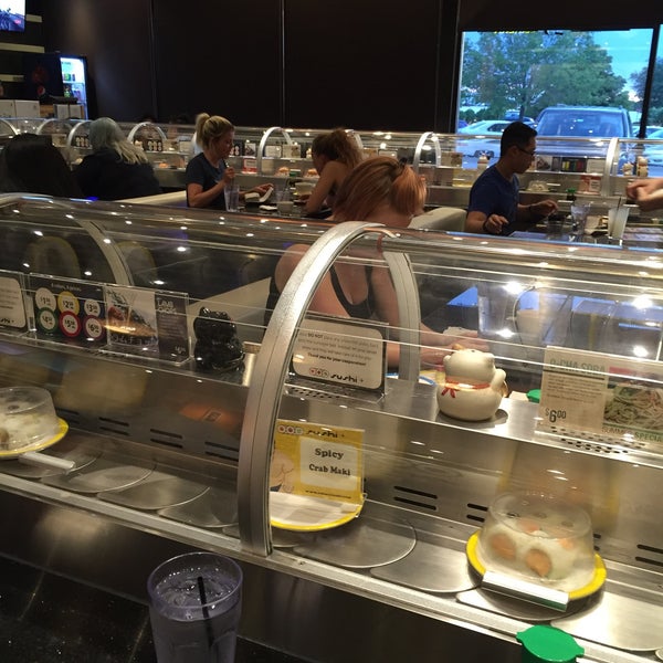 Photo taken at Sushi + Rotary Sushi Bar by Christanh N. on 6/6/2016