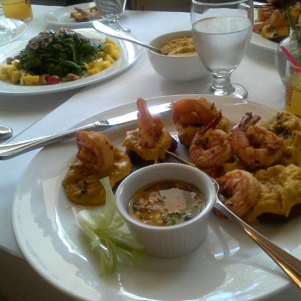 Photo taken at Malagueta Restaurant by Atlanta A. on 7/27/2013