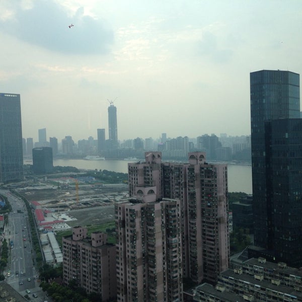 Photo taken at The Eton Hotel Shanghai (裕景大饭店) by Volkan Ö. on 9/25/2014