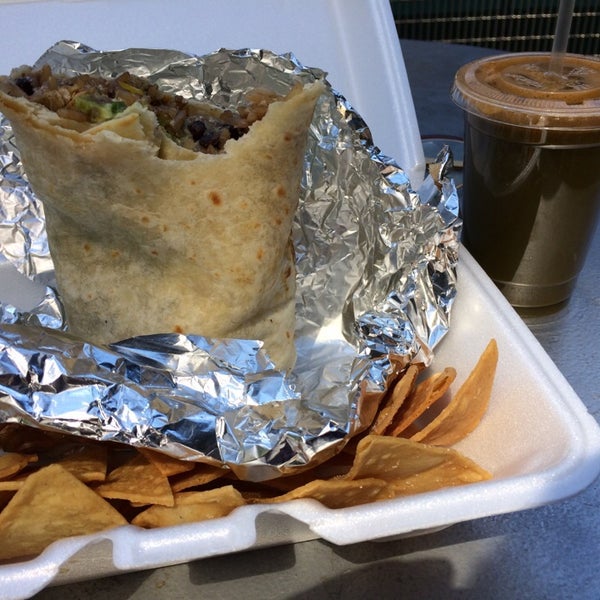 Burritos are good, come with chips. Juice bar is wonderful. Also serving, pizza, Japanese, sushi, Asian noodles, hot food buffet bar, salad bar. Tons of coffee options. Midtown pricey.