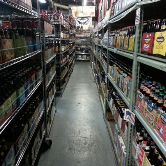 Photo taken at New Beer Distributors by Jordan E. on 11/30/2012