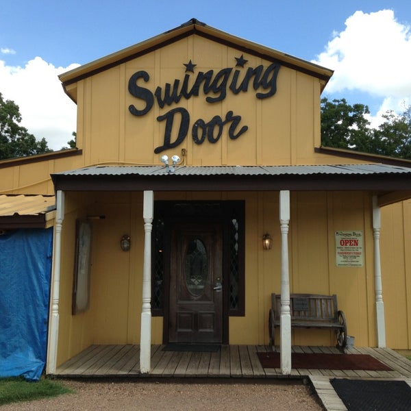 Photo taken at The Swinging Door by M G. on 8/3/2013