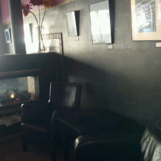 Photo taken at Crescendo Espresso Bar + Music Cafe by Alida L. on 11/28/2012