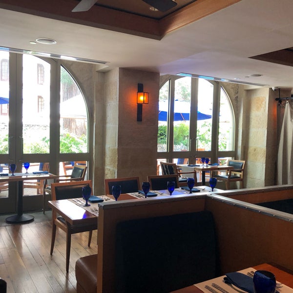 Photo taken at Ostra Restaurant by Austin on 8/6/2019