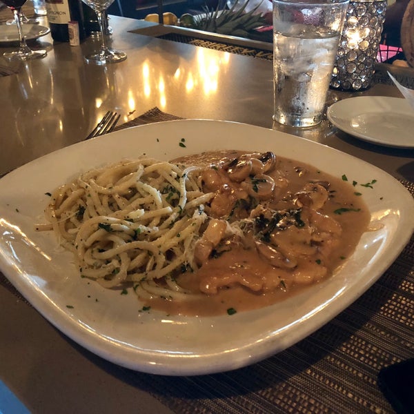 Photo taken at Capone&#39;s Italian Cucina by Lisa F. on 8/24/2018