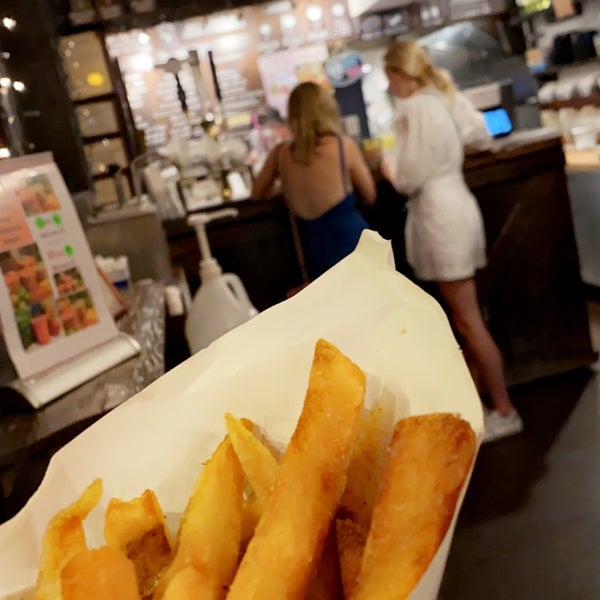 Photo taken at Pommes Frites by A S. on 7/28/2021