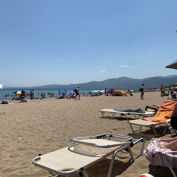 Photo taken at Moraitis Beach by Kostas G. on 6/16/2019