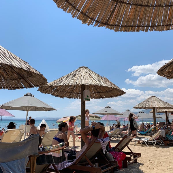 Photo taken at Moraitis Beach by Kostas G. on 6/15/2019