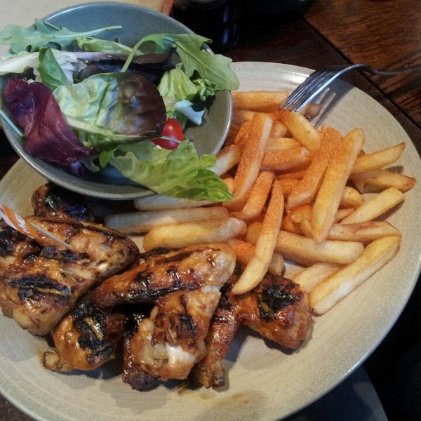 Photo taken at Nando&#39;s by Petrica G. on 5/18/2013