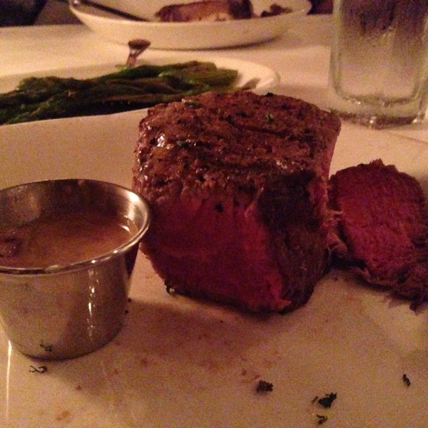 Photo taken at Sullivan&#39;s Steak House by Radek T. on 7/10/2013