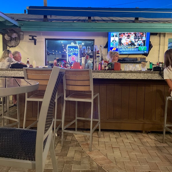 Get drinks at a bar while waiting to get seated. They have seats available right outside the restaurant with the water view where you can wait to be seated peacefully.