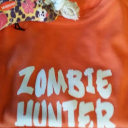 There are still a few days of the BOGO 50% off sale now going on!! Why not stop by and pick up one of these "Zombie Hunter" tee shirts! We have a few left!