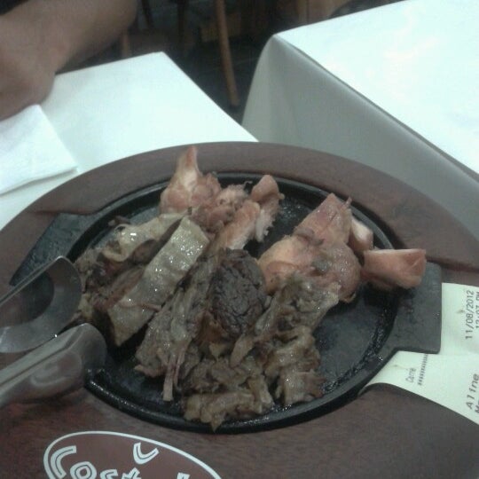 Photo taken at Costela Premium Ribs by Claudině J. on 11/8/2012