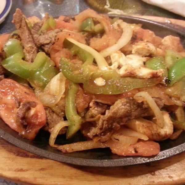 Photo taken at El Tapatio Mexican Restaurant by Laura L. on 1/1/2014