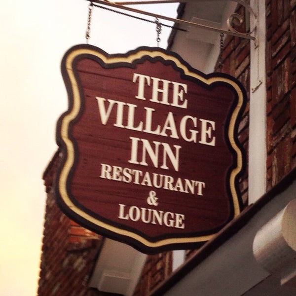 Photo taken at The Village Inn by John C. on 12/12/2014