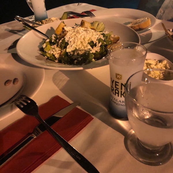 Photo taken at Tymnos Restaurant by Fatih A. on 7/15/2018