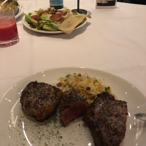 Photo taken at Fleming&#39;s Prime Steakhouse &amp; Wine Bar by Saniy Y. on 8/13/2019
