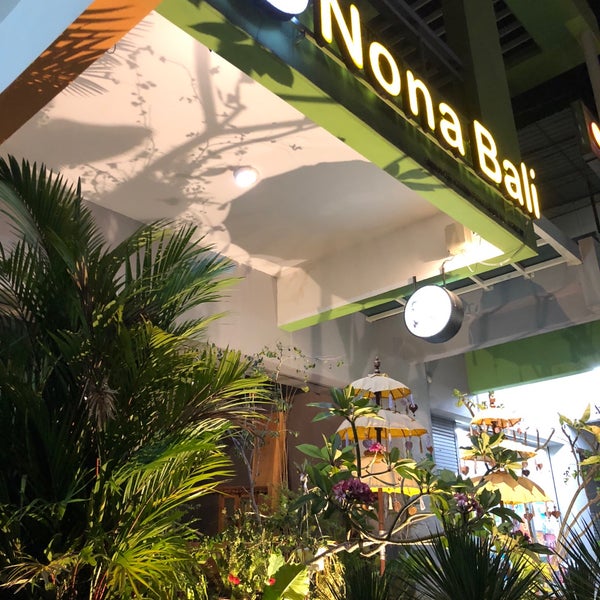 Photo taken at Nona Bali Restaurant by David C. on 4/6/2018