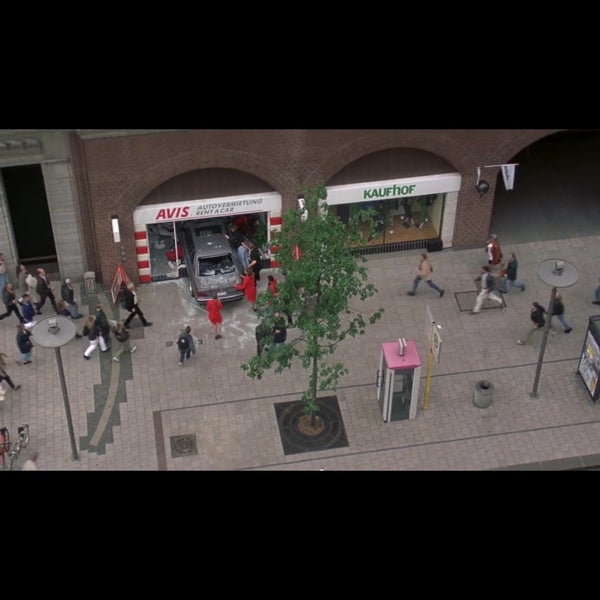 When James Bond's BMW comes crashing to earth following a chase through a parking lot in Tomorrow Never Dies (1997) it smashes through the front of the hire company at the corner of Galeria Kaufhof.