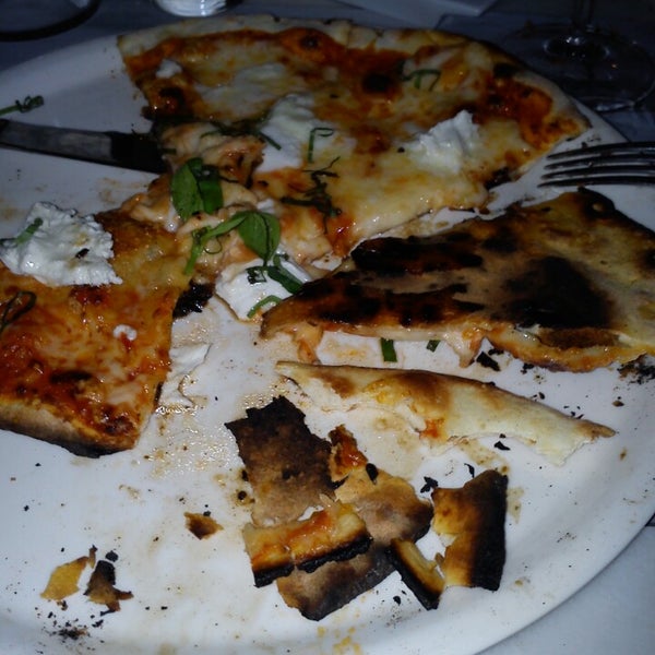 Although pizza tastes good, it was burnt...