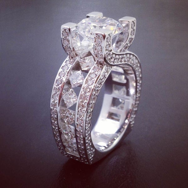 "Custom creations for finer tastes." That's Christopher Diamonds! View us online: http://bit.ly/14DyYNk