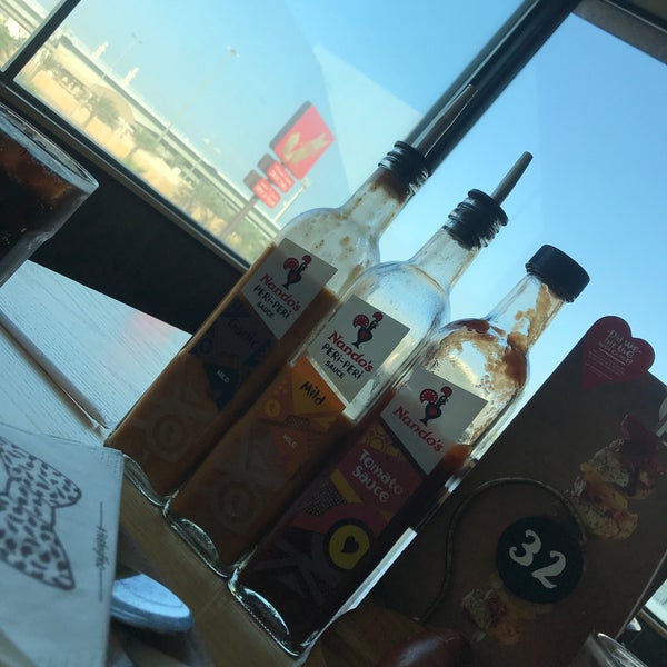 Photo taken at Nando&#39;s Zayed Town by Noof . on 11/21/2019