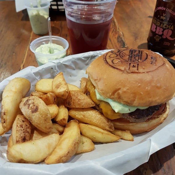 Photo taken at Dock Burger by Raquel S. on 7/13/2018