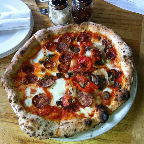 Photo taken at Tutta Bella Neapolitan Pizzeria by Matthew J. on 5/18/2013
