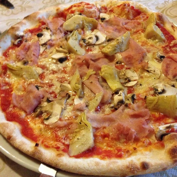 Photo taken at Casanova Ristorante Pizzeria by Maiko M. on 4/26/2014