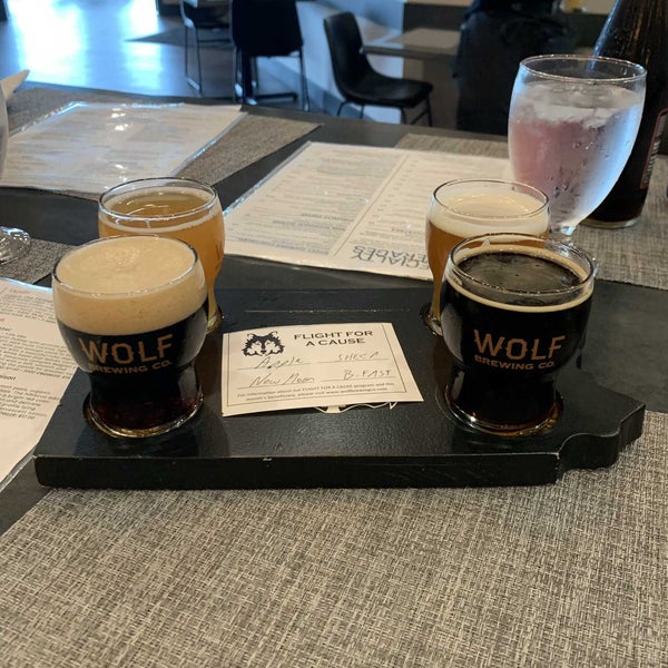 Photo taken at Wolf Brewing Co. by Ashley H. on 7/16/2022